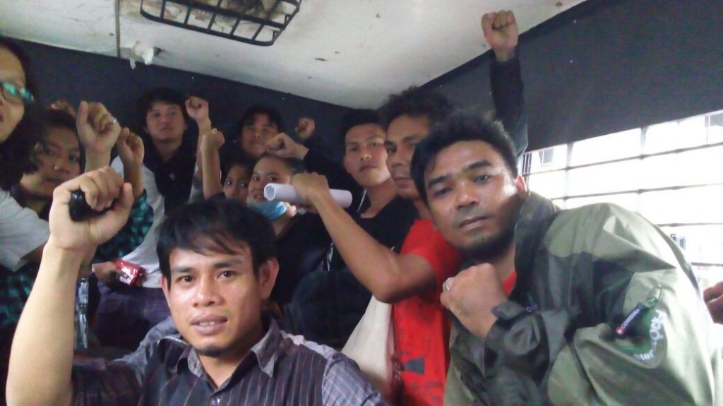 This photo is taken from inside police bus, on their way to Jakarta Police Headquarters
